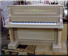 button to upright piano